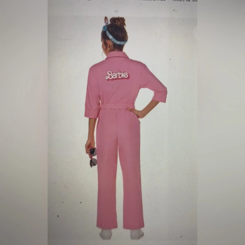 NWT  Spirit Halloween Barbie the Movie Kids Pink Power Jumpsuit size large 12-13